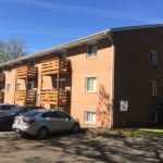 Brick Apartment Complex with Wood decks